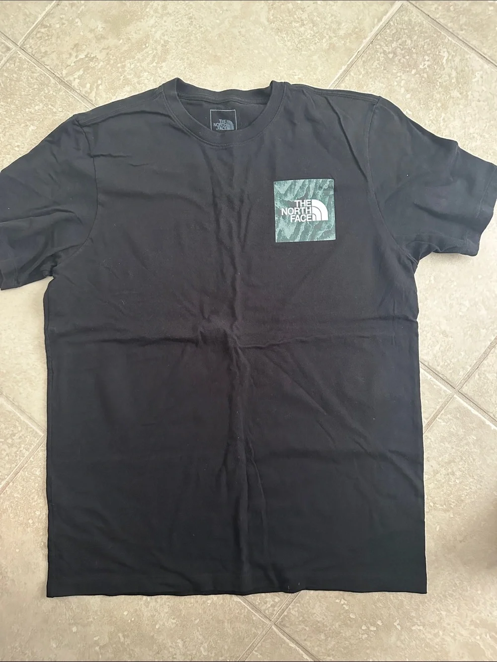 The North Face Black Short-Sleeve Tee with Green Logo Pocket